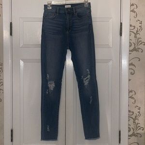 Sneak Peek Distressed Skinny Jeans
